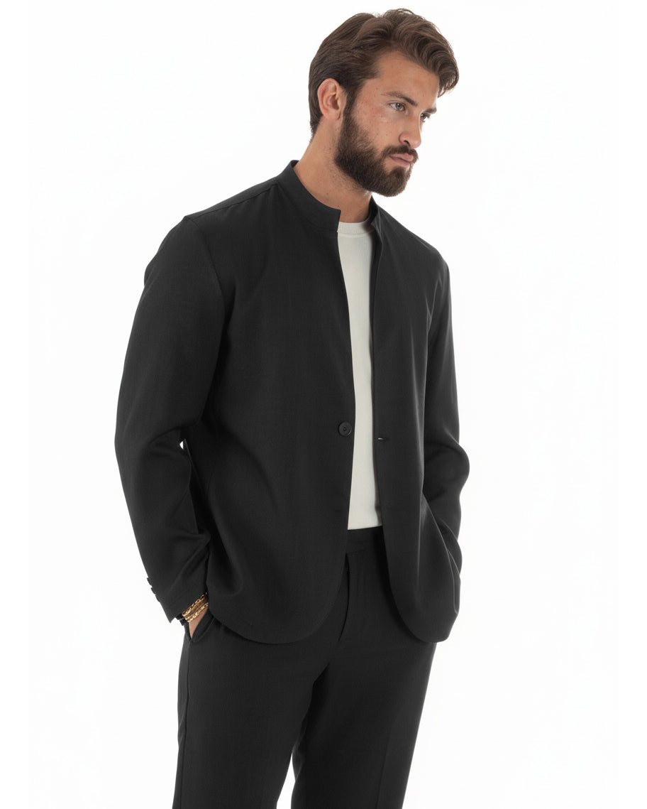 Dettaglio tasche a filetto giacca nero collo coreano monopetto