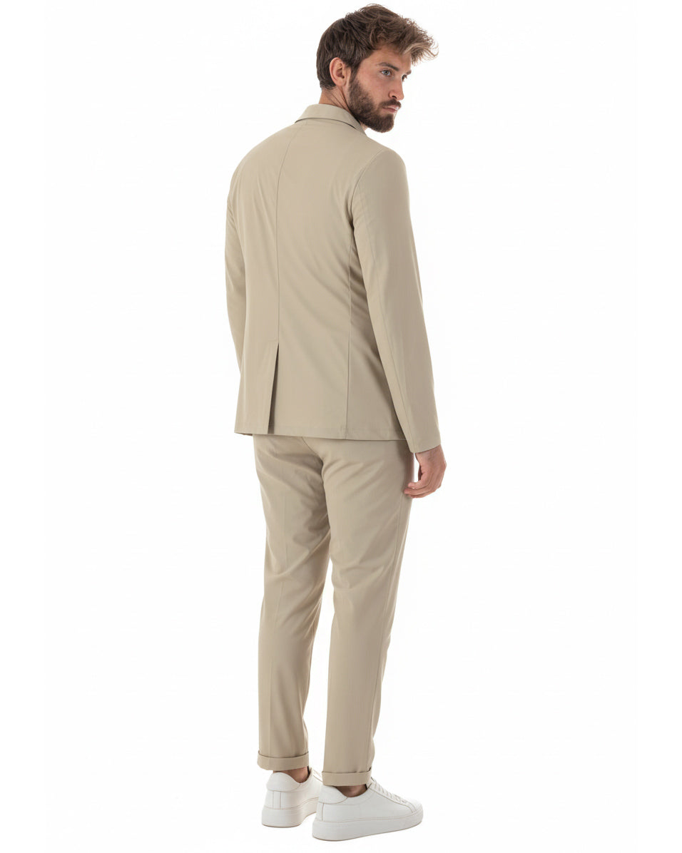 Vista posteriore giacca monopetto beige no stiro tasconi uomo