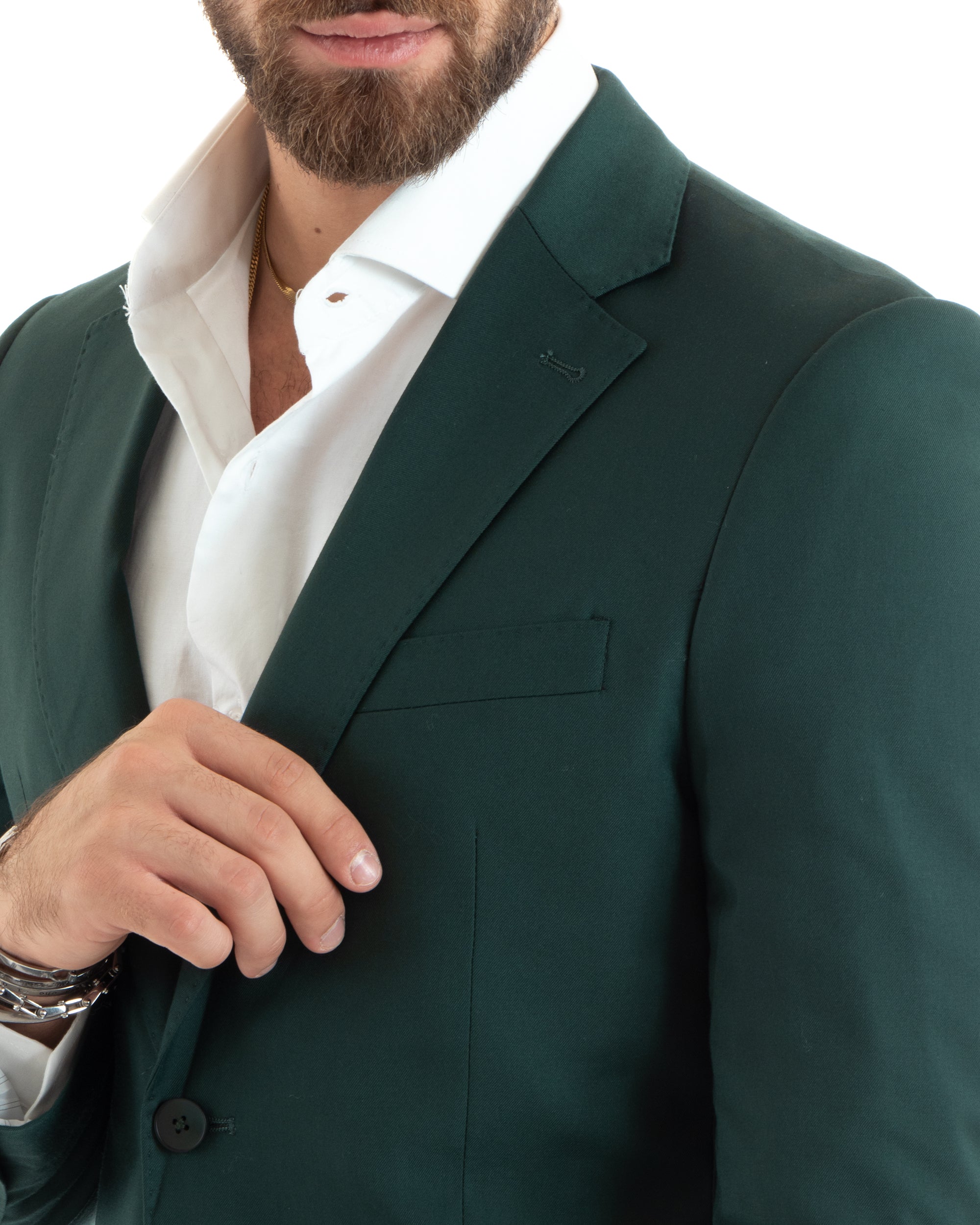 Dettaglio tasche a filetto giacca monopetto verde uomo sartoriale
