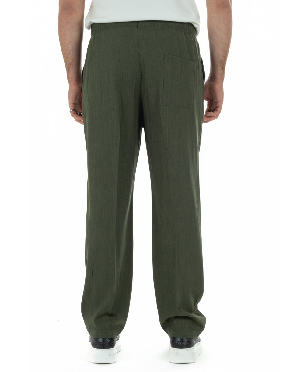 Vista completa posteriore pantaloni uomo verde baggy viscosa fondo largo urbano