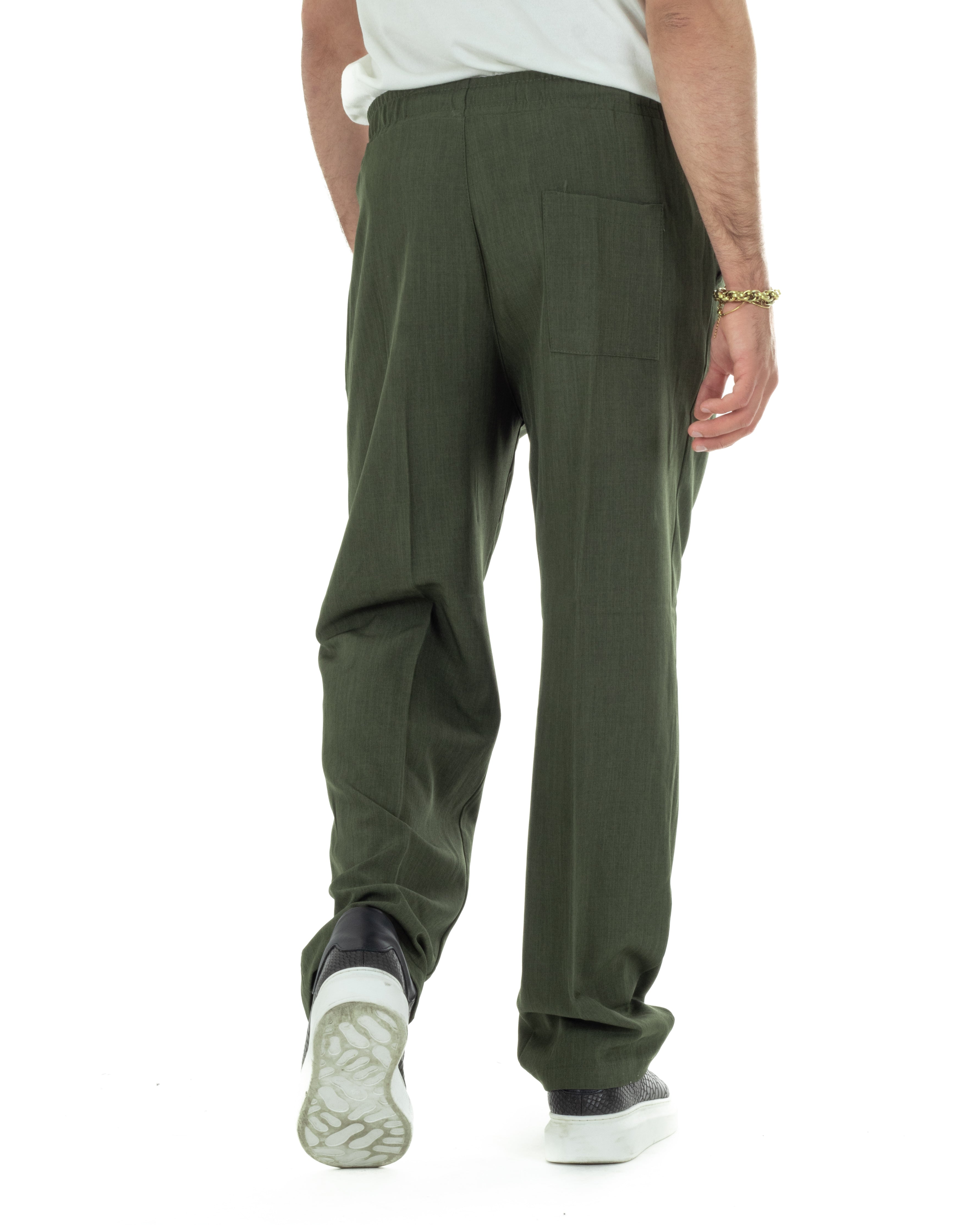 Vista posteriore pantaloni baggy verde viscosa fondo largo casual