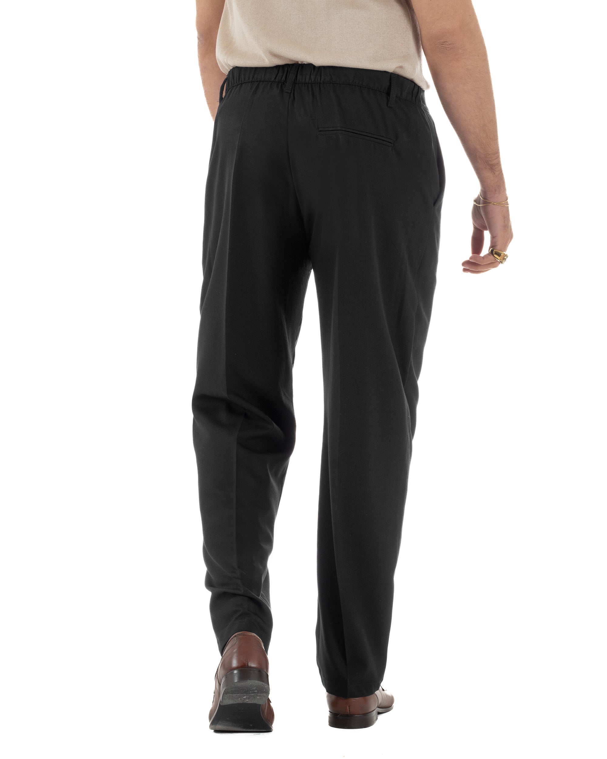 Vista posteriore pantaloni uomo nero baggy fondo largo elastico retro