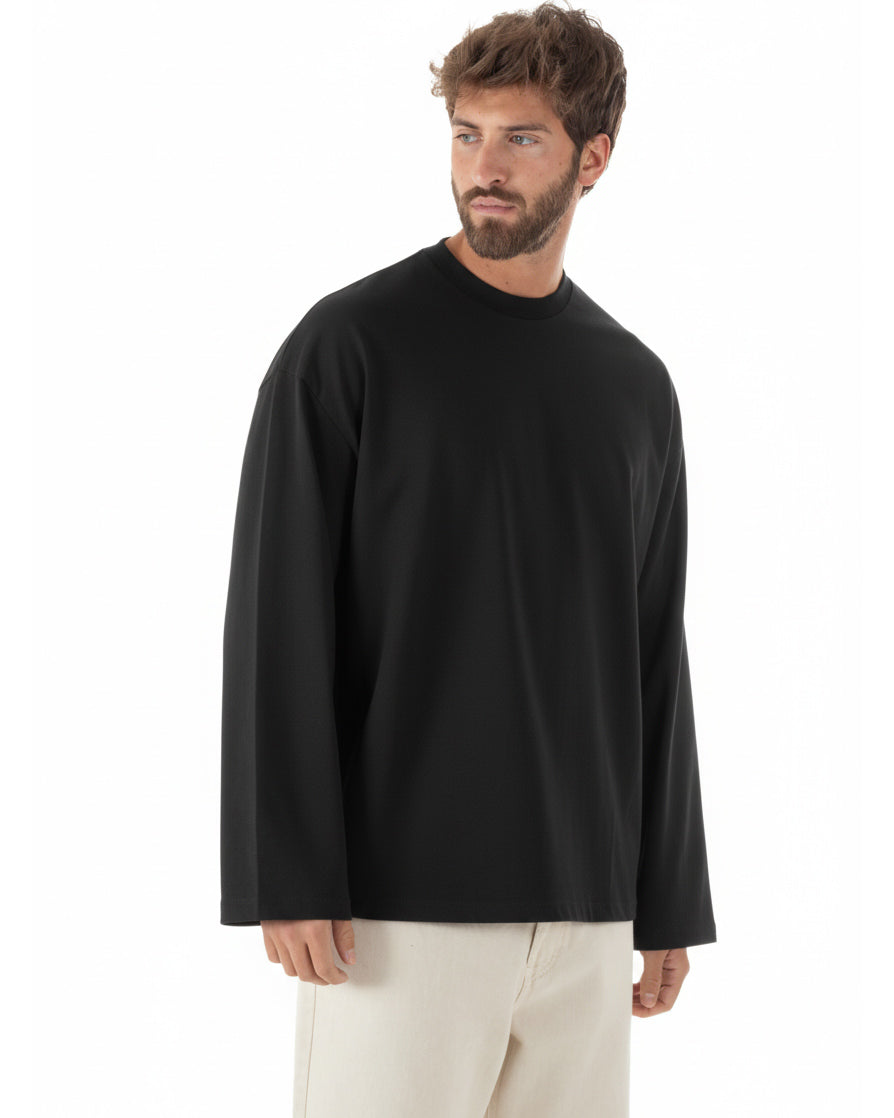 Vista laterale maglia uomo nero maniche lunghe oversize cotone casual