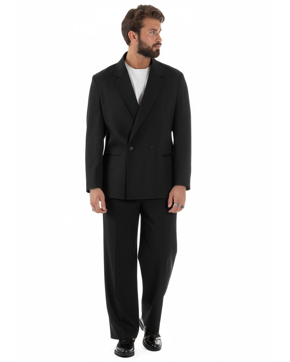 Vista frontale completa abito uomo nero doppiopetto baggy fit casual