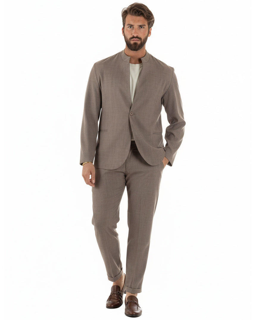 Dettaglio tasche a filetto giacca fango collo coreano monopetto