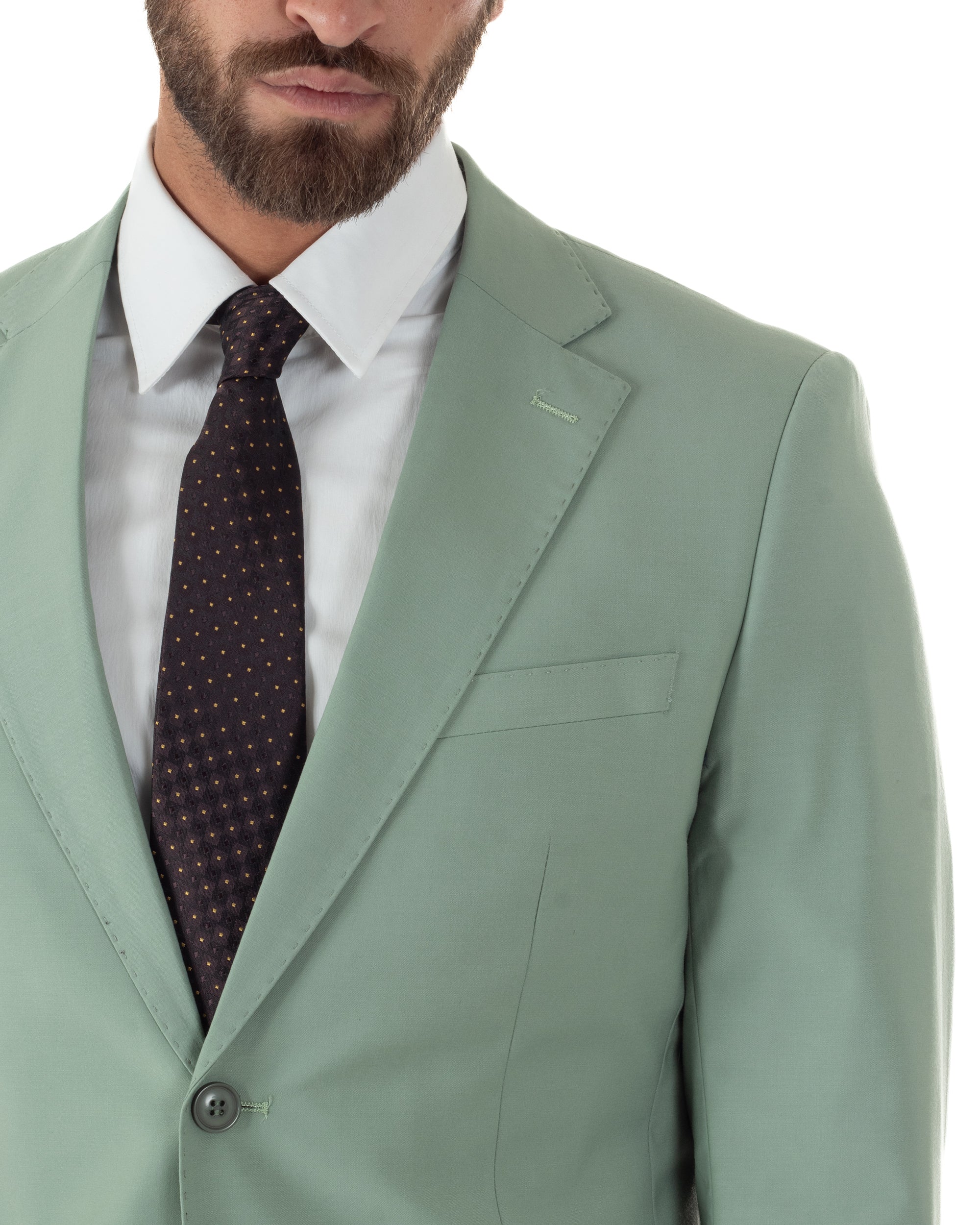 Dettaglio tasche a filetto con patta giacca monopetto verde salvia uomo