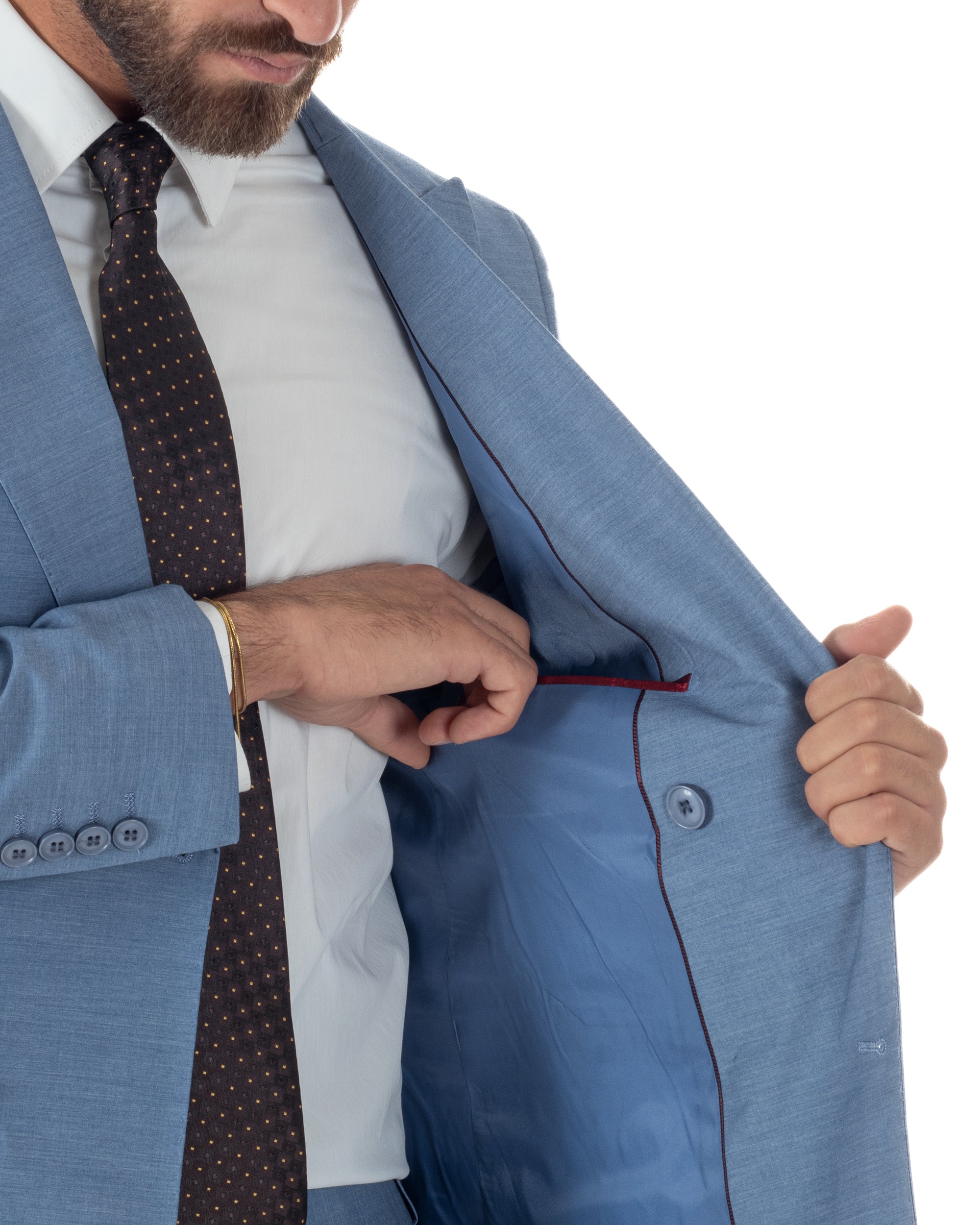 Dettaglio tasca a filetto con patta giacca doppiopetto denim slim fit uomo