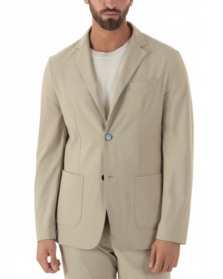Vista frontale giacca monopetto beige no stiro tasconi regular fit uomo
