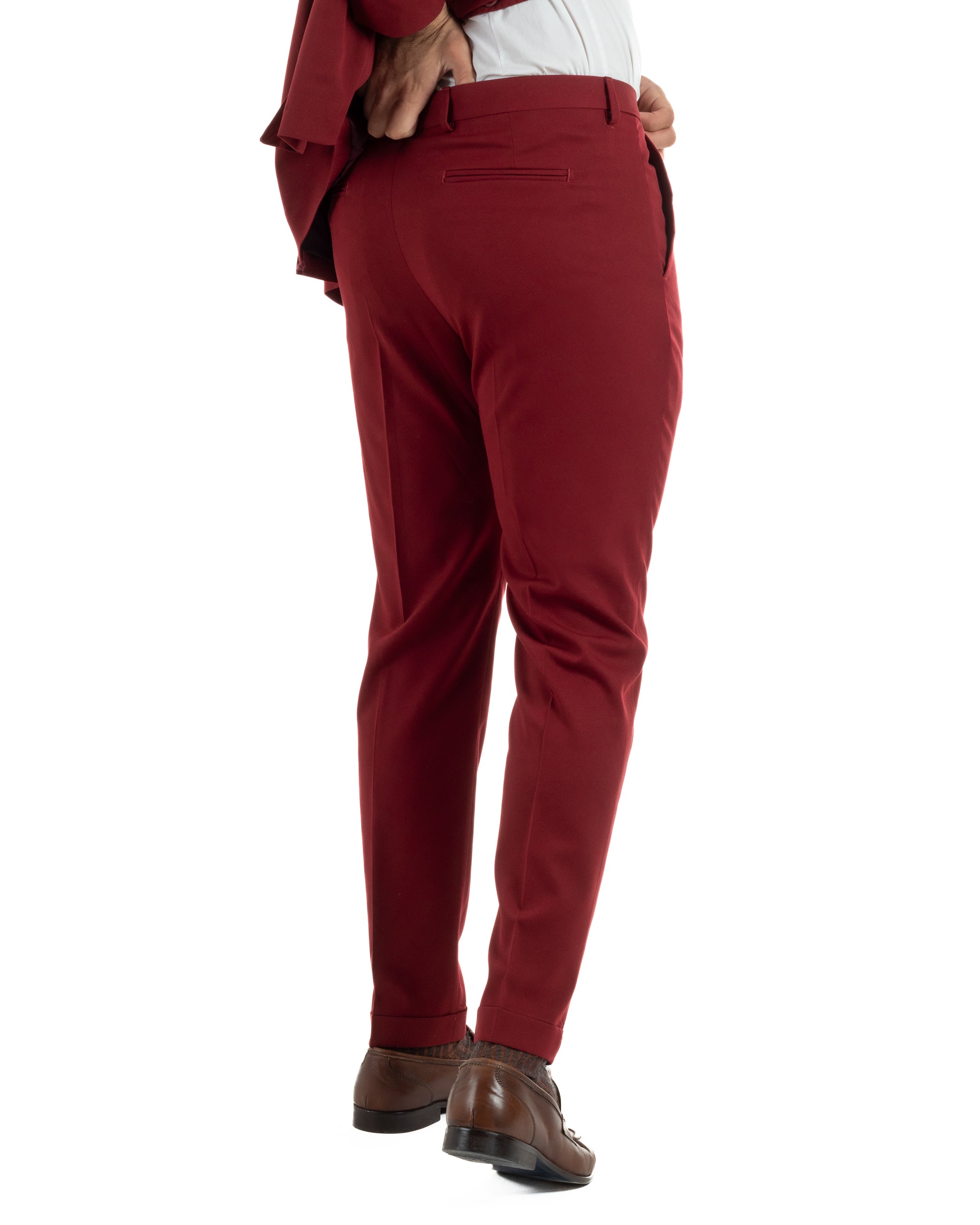 Dettaglio tasche patta laterali abbottonatura pantaloni bordeaux slim fit 79% poliestere rayon