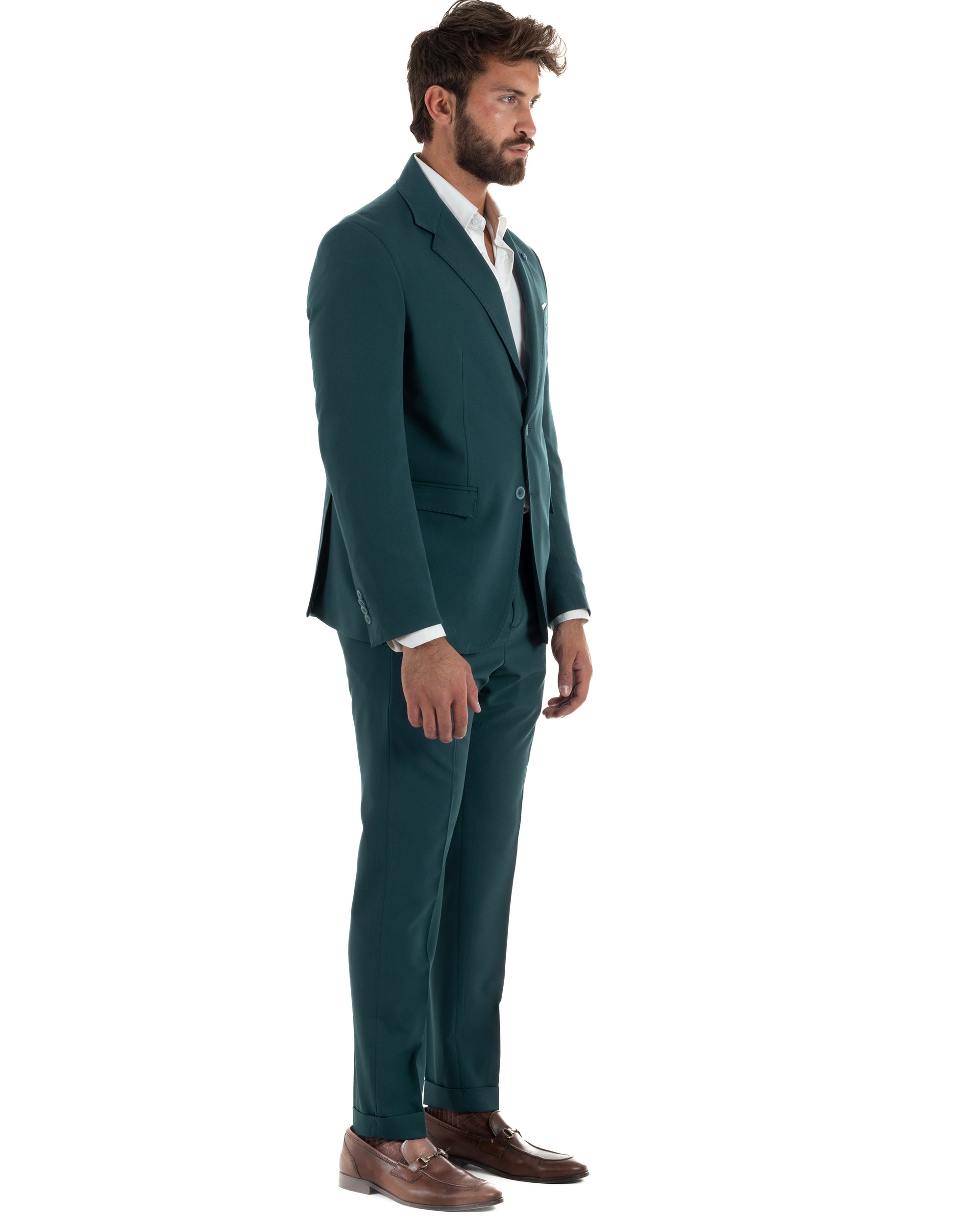 Vista laterale abito uomo petrolio monopetto giacca slim fit pantaloni affusolati spalla strutturata