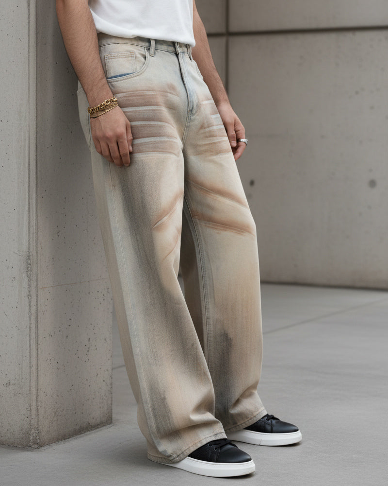 Vista laterale jeans uomo super baggy denim sabbiato vestibilità ampia