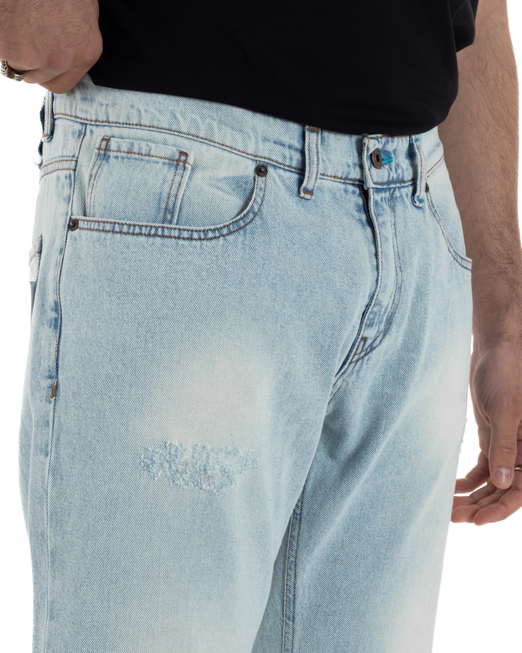 Dettaglio strappi distressed jeans uomo denim regular fit 100% cotone Berna