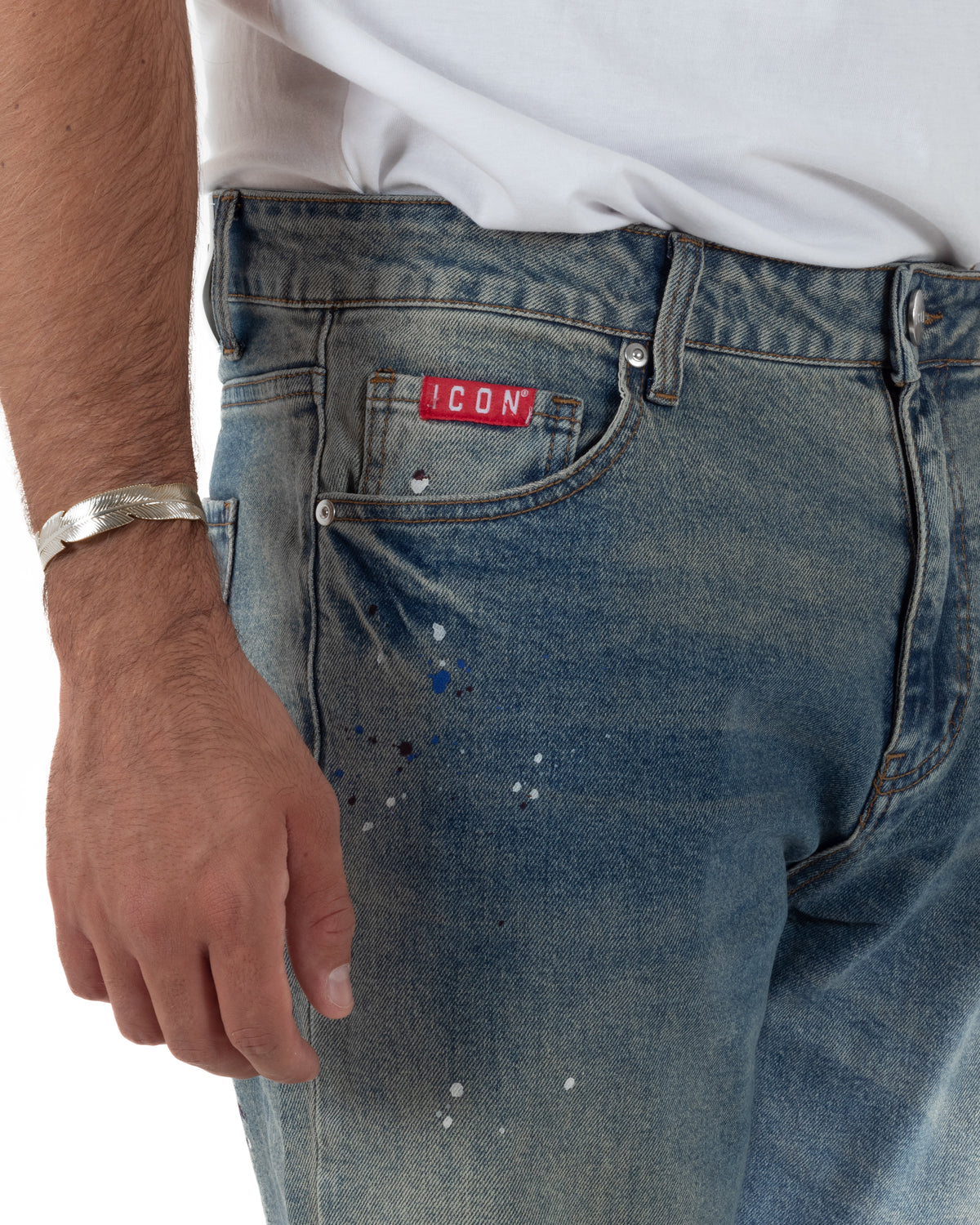 Pantaloni jeans uomo slim fit con dettagli effetto vernice