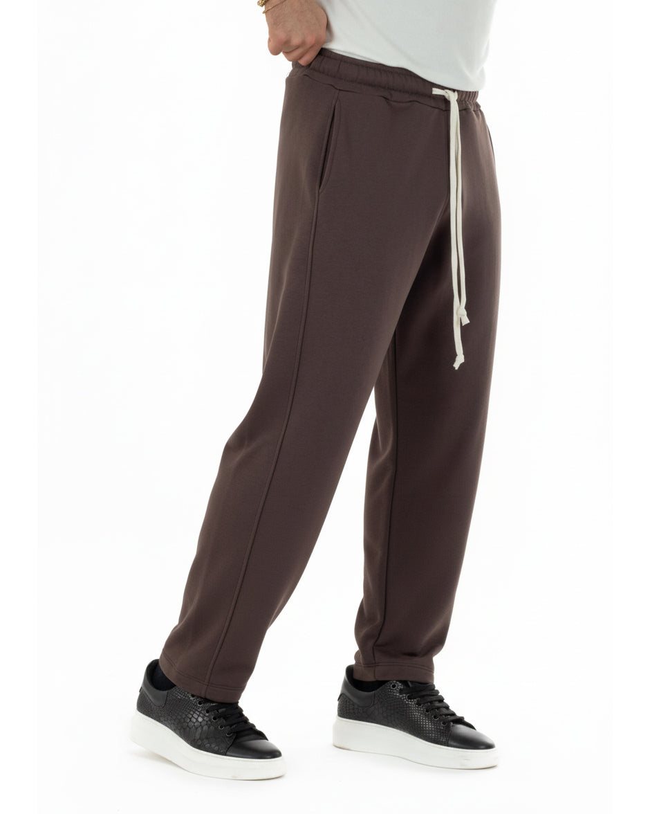  Vista laterale pantaloni uomo marrone balloon fit vestibilità ampia casual