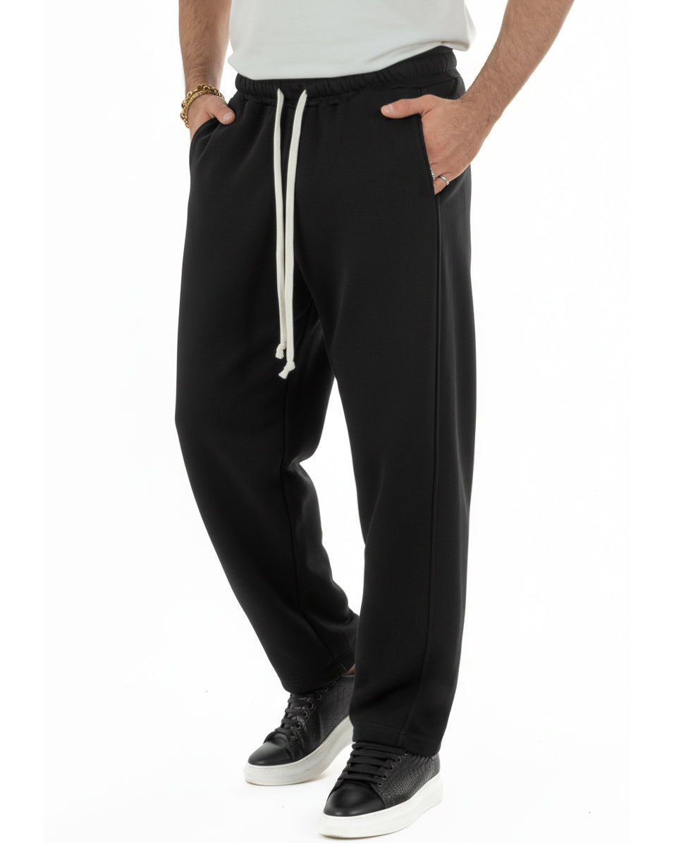 Vista frontale pantaloni tuta grigio balloon fit japan baggy uomo