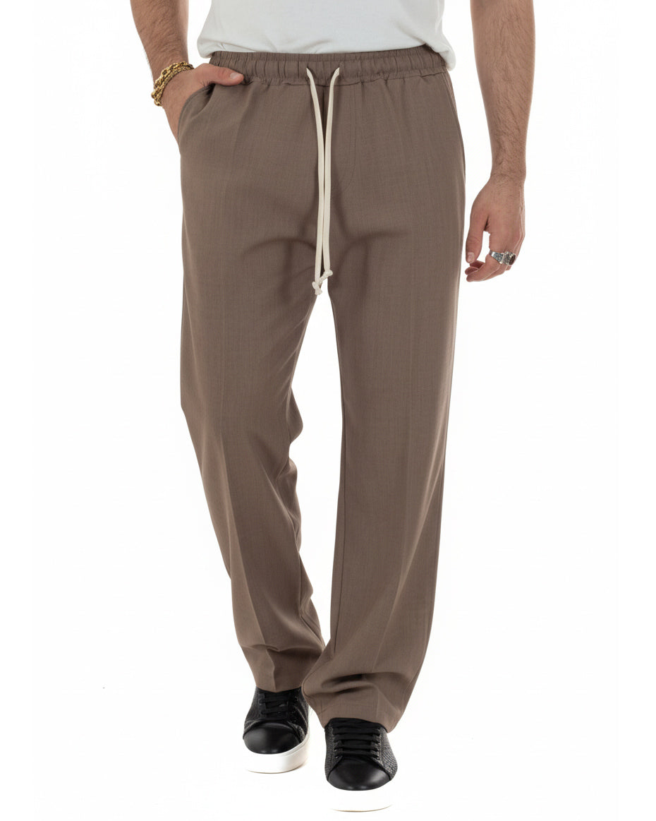 Pantaloni uomo marrone oversize viscosa con coulisse e tasche america