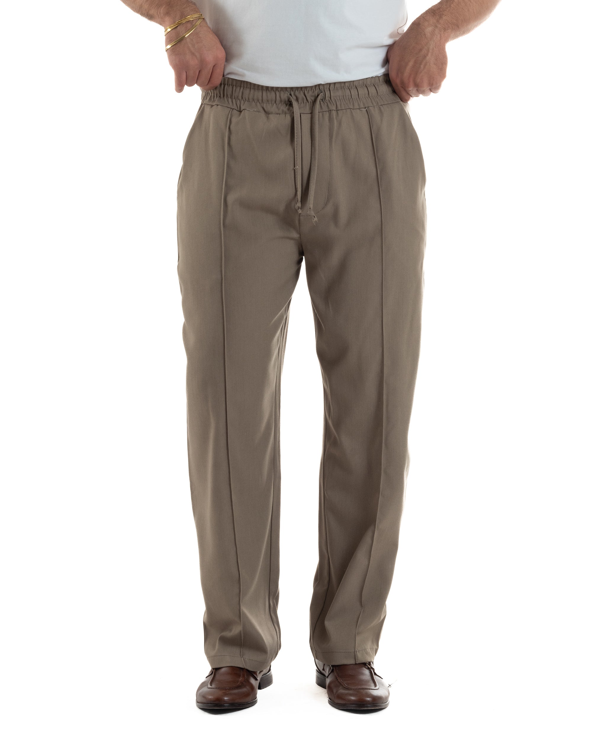 Vista frontale pantaloni beige uomo wide leg coulisse annodata nervatura sartoriale tasche filo